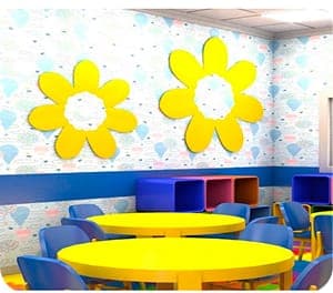 Accessible classroom with bright yellow tables.